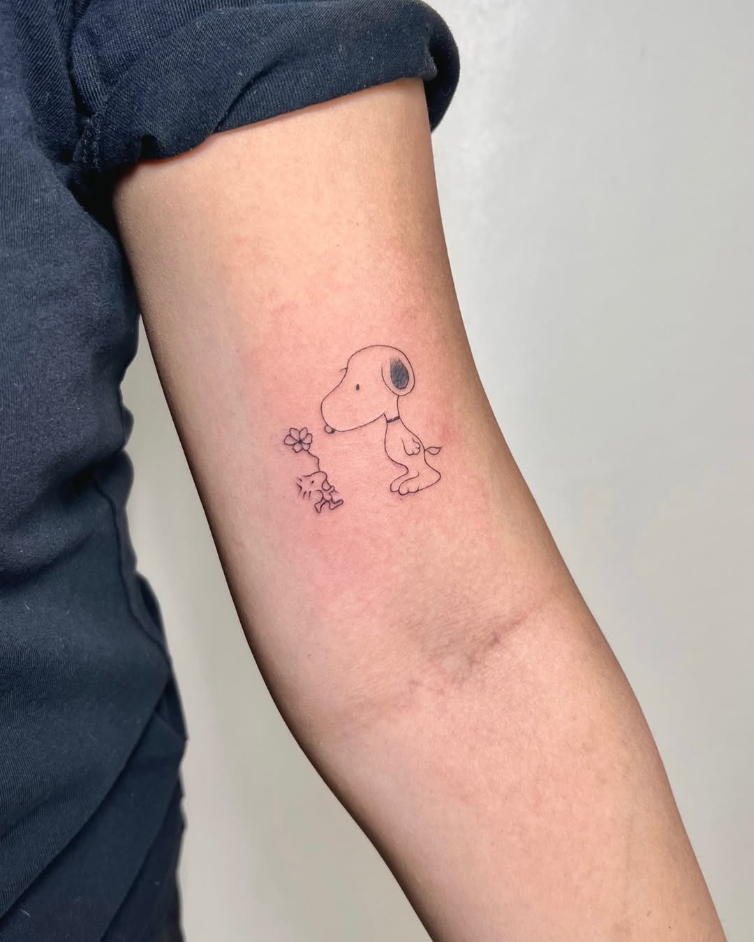 29 Snoopy Tattoo Ideas: Tiny Fine-Line, Joe Cool & Classic Designs for Women and Men