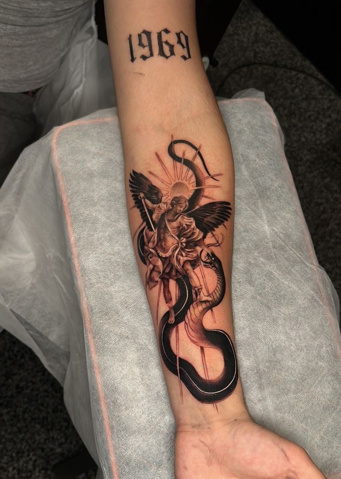 28 Archangel Michael Tattoo Designs for Men and Women   Realism, Sleeve, and Geometric Ideas