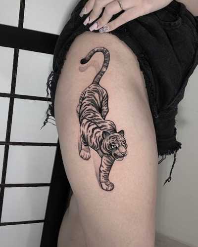 25 Tiger Tattoo on Thigh Ideas