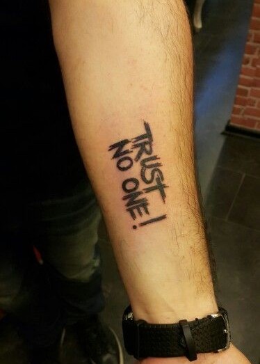 25 Trust No One Tattoo Designs with Lettering, Fonts, Ideas for Men and Women