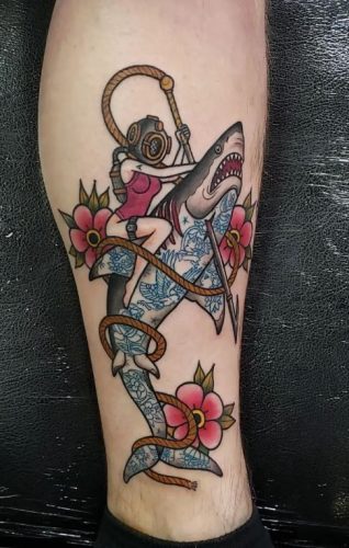 Explore 18 Stunning Shark Tattoo Designs for : From Elegant Minimalism to Vibrant Watercolors