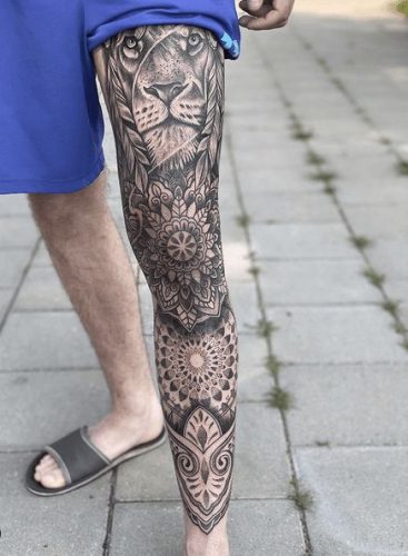 Leg Lion Tattoo: 22 Dynamic Designs for a Daring Look