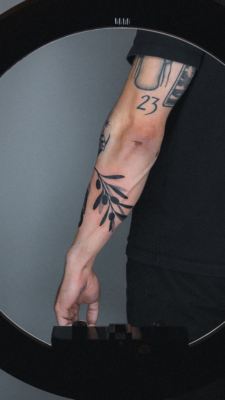 26 Olive Branch Tattoo Ideas : Fine Line, Arm Wrap, Minimal, American Traditional Designs