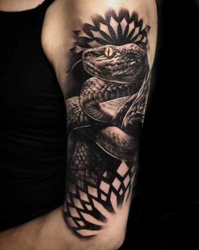 29 Mesmerizing Snake Tattoo Design Ideas