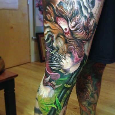 25 Tiger Tattoo on Thigh Ideas