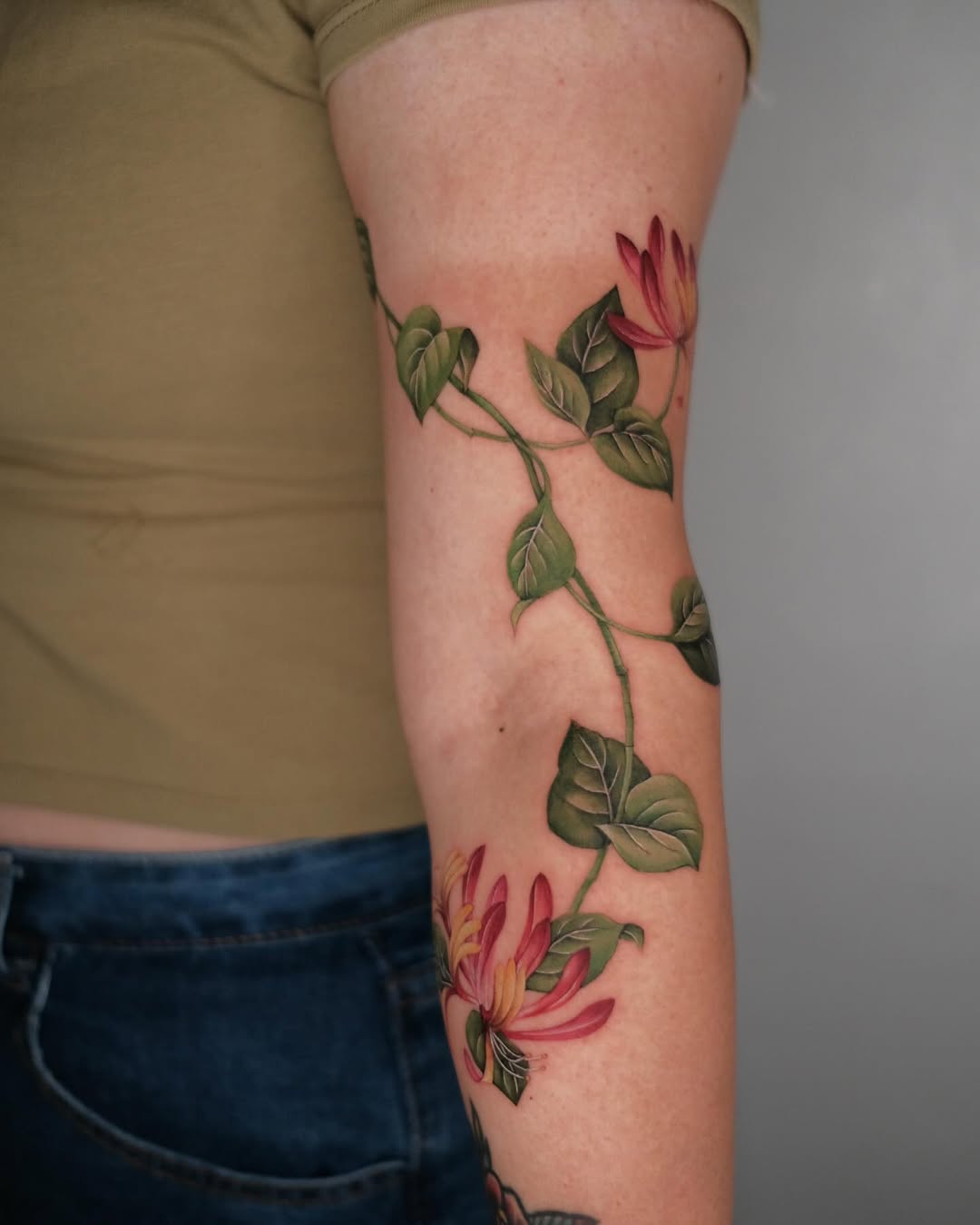 29 Honeysuckle Tattoo Ideas with Fine Line, Neo Traditional, Coral, and American Traditional Designs