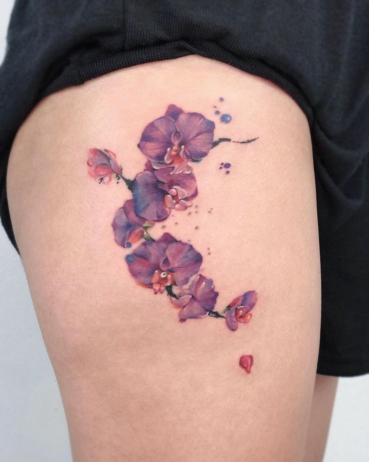 26 Orchid Tattoo Ideas for Minimalist, Colour, and Fine Line Designs