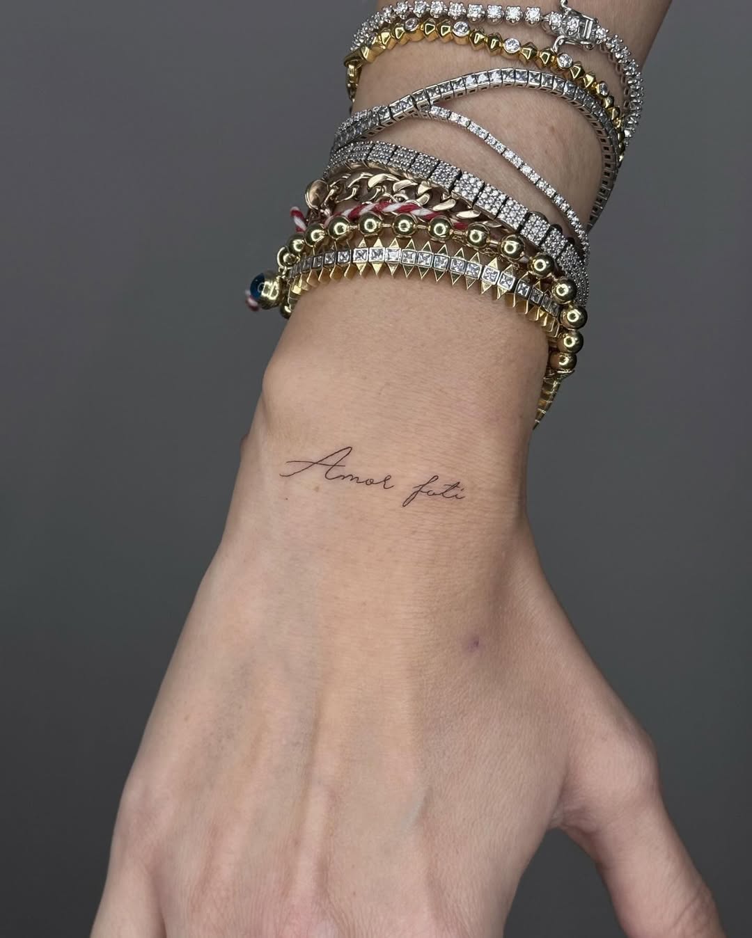 25 Amor Fati Tattoo Ideas Unique Designs, Fonts, and Placement Inspiration for Men & Women
