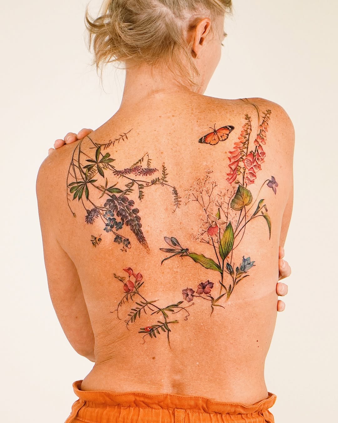 29 Wildflower Tattoo Ideas: Dainty Fine Line, Arm Sleeves, Ankle Wraps, Minimalist Shoulder Designs