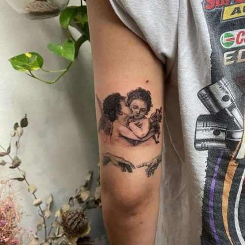 Explore 20 Stunning Angel Tattoo Designs for : From Seraphims to Cherubic Delights