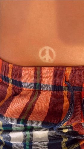 15 Creative Tan Tattoo Ideas for : Embrace the Sun with Stylish Skin Art