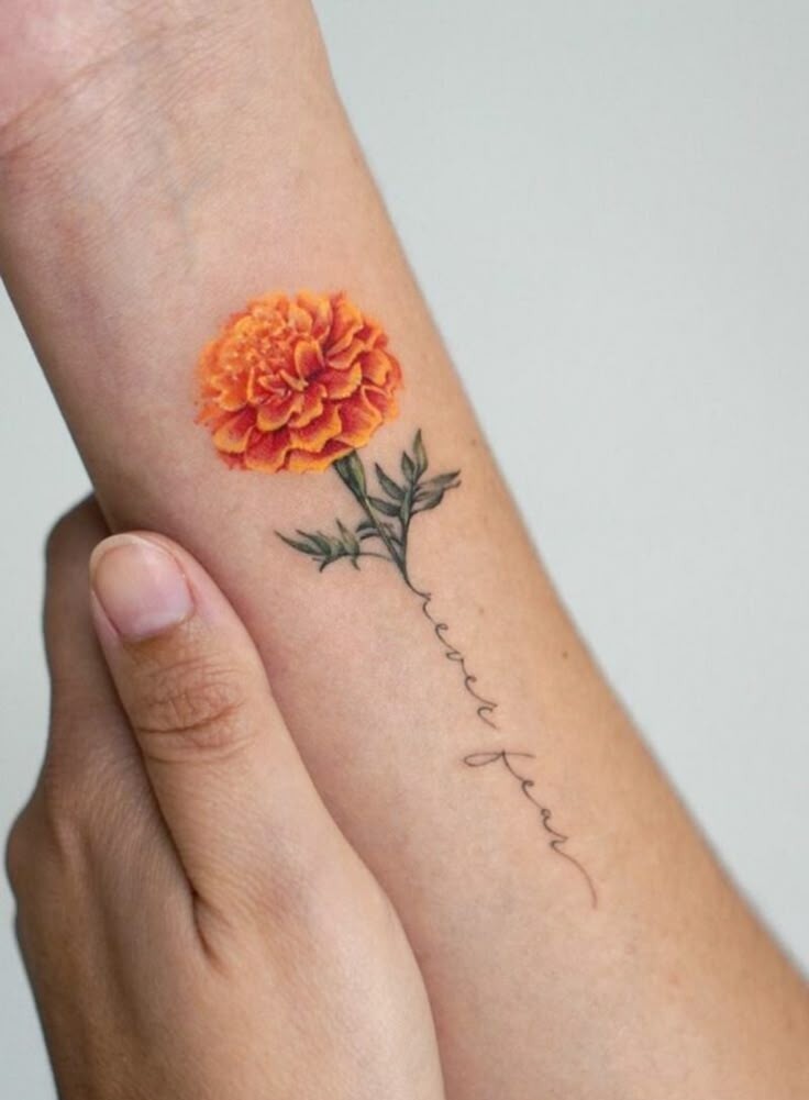 26 Marigold Tattoo Ideas for Every Style Fineline, Realistic, Black and White, Traditional, and Color Designs