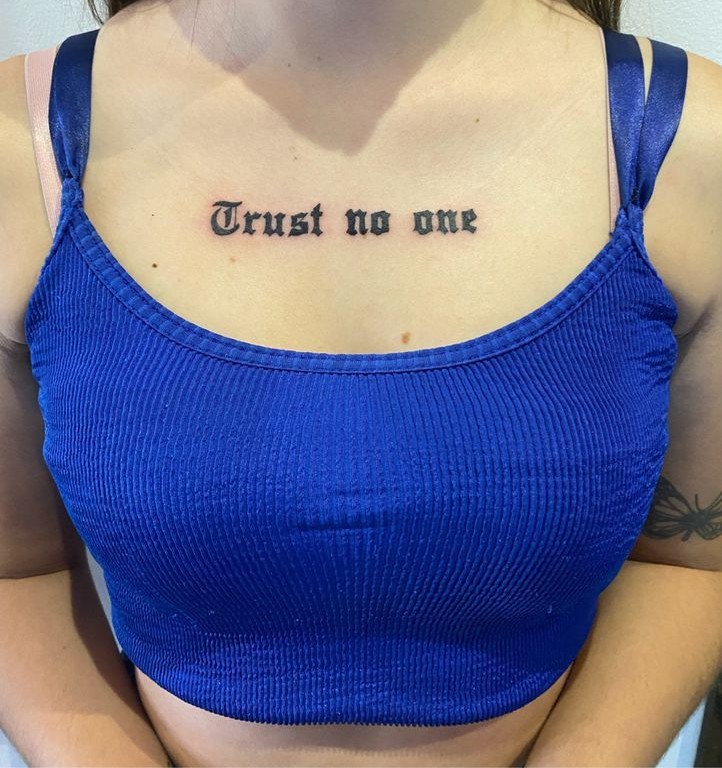 25 Trust No One Tattoo Designs with Lettering, Fonts, Ideas for Men and Women