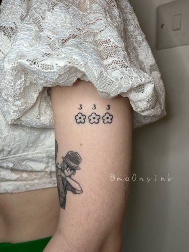 Celestial Sequences: 19 Angel Number Tattoo Ideas for