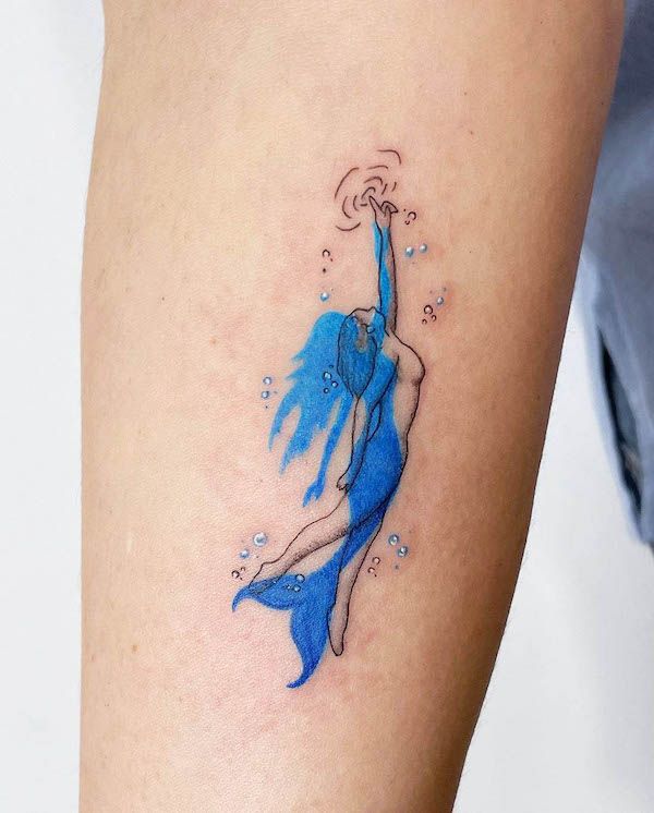 27 Mermaid Tattoo Ideas With Minimalist, Traditional, Afro, Siren, and Barbie-Inspired Designs
