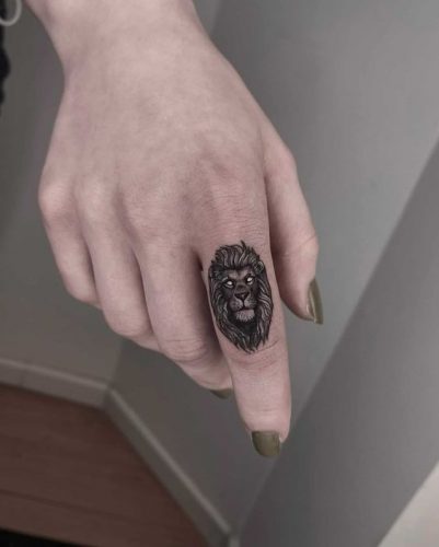 Fierce and Detailed: 19 Lion Tattoo on Finger Ideas
