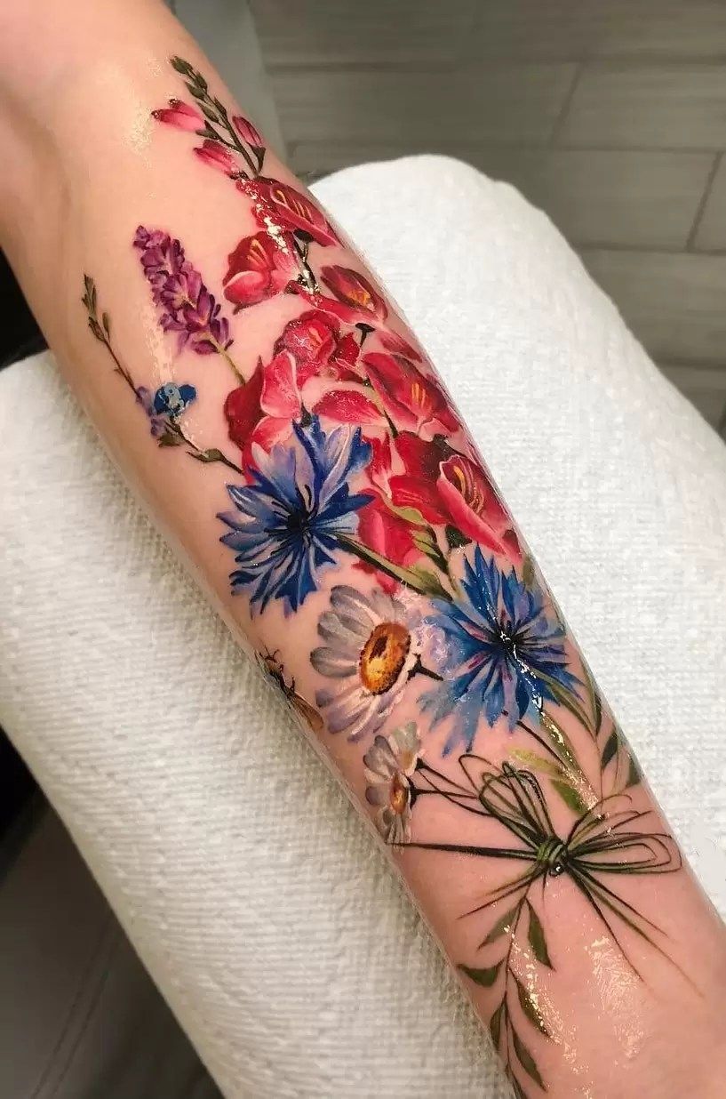 29 Wildflower Tattoo Ideas: Dainty Fine Line, Arm Sleeves, Ankle Wraps, Minimalist Shoulder Designs