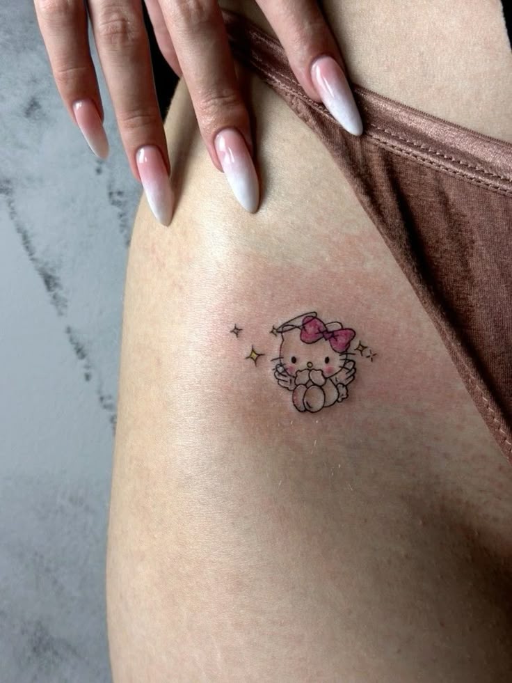 Hello Kitty Tattoo 29 Ideas for Women, Men & Couples Sleeve, Fine Line, Y2K, Cien Pies & More