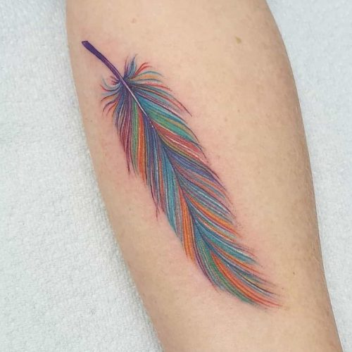 Explore Vibrant Feather Tattoo Ideas: Designs for Men and Women with Artistic and Cultural Significance