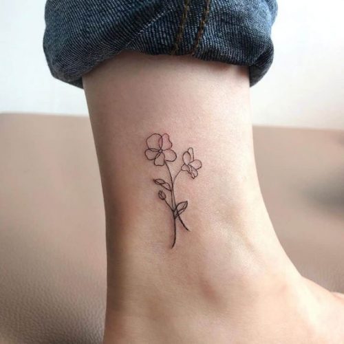 Discover the Charm of February Birth Flower Tattoos: Violets & Primroses Ink Ideas