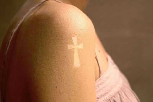 15 Creative Tan Tattoo Ideas for : Embrace the Sun with Stylish Skin Art