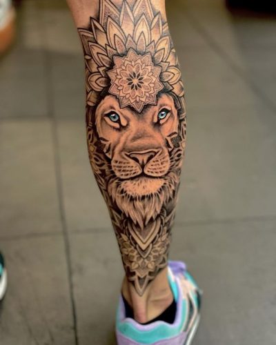 Leg Lion Tattoo: 22 Dynamic Designs for a Daring Look