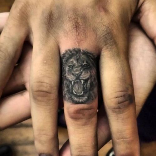 Fierce and Detailed: 19 Lion Tattoo on Finger Ideas