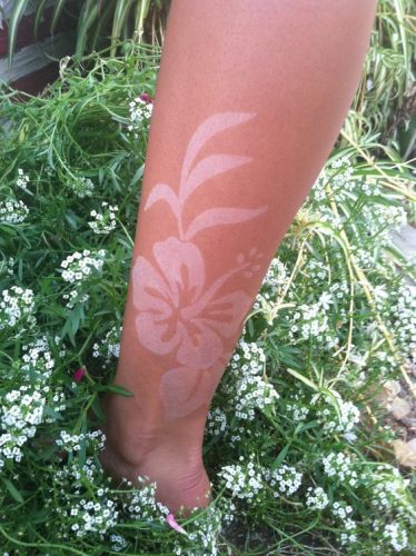15 Creative Tan Tattoo Ideas for : Embrace the Sun with Stylish Skin Art