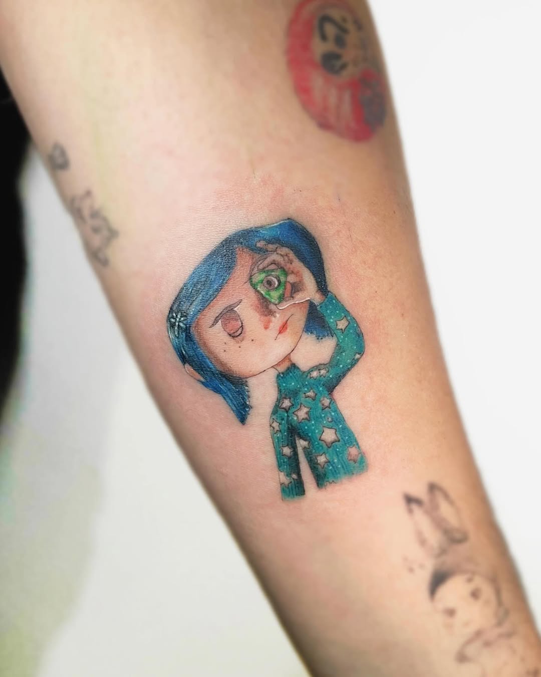 30 Coraline Tattoo Ideas: From Button-Eyed Whimsy to Dark Fairytale Ink