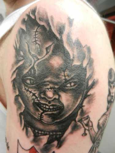 19 Chucky Tattoo Ideas: Embrace Fear with Playful Horror Ink