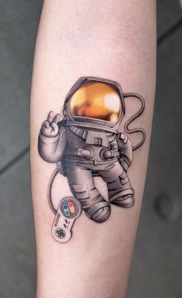 Astronaut Tattoo Ideas for Men and Women Minimalist, Stencil Outline, and Cosmic Designs