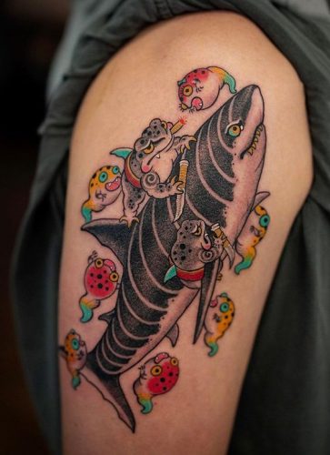 Explore 18 Stunning Shark Tattoo Designs for : From Elegant Minimalism to Vibrant Watercolors