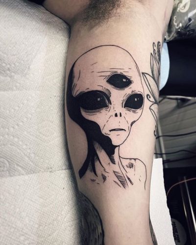 Explore the Cosmos with Style: 20 Stunning Alien Tattoo Ideas to Inspire Your Next Ink Adventure in