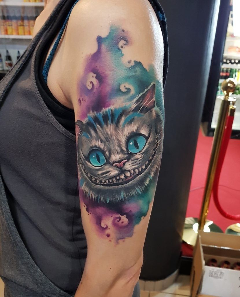 29 Cheshire Cat Tattoo Ideas: From Whimsical Grins to Dark Wonderland Symbolism