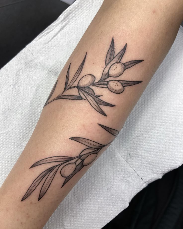 26 Olive Branch Tattoo Ideas : Fine Line, Arm Wrap, Minimal, American Traditional Designs