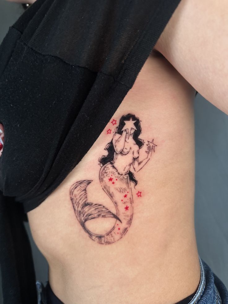 27 Mermaid Tattoo Ideas With Minimalist, Traditional, Afro, Siren, and Barbie-Inspired Designs