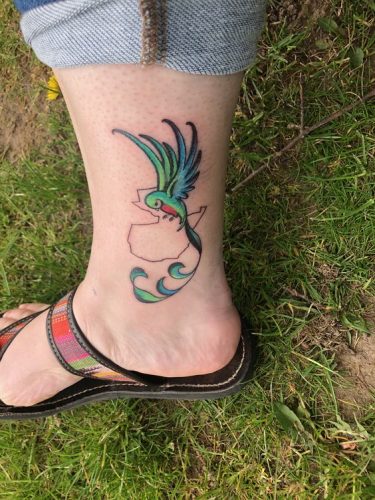 Explore 20 Captivating Quetzal Tattoo Designs for a Vibrant Ink Inspiration