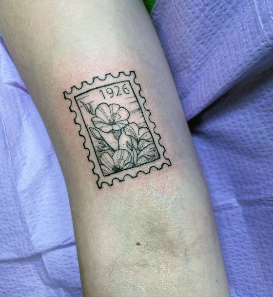 30 Unique Stamp Tattoo Ideas with Travel, Floral, Vintage, Fine Line, and Matching Postage Designs