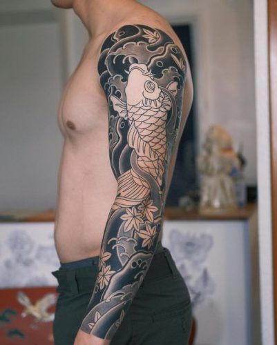 Discover 20 Stunning Fish Tattoo Ideas: From Traditional Japanese Koi to Whimsical Designs