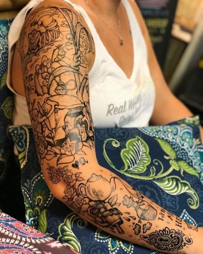 Immerse in the Magic: 15 Alice in Wonderland Tattoo Sleeves for