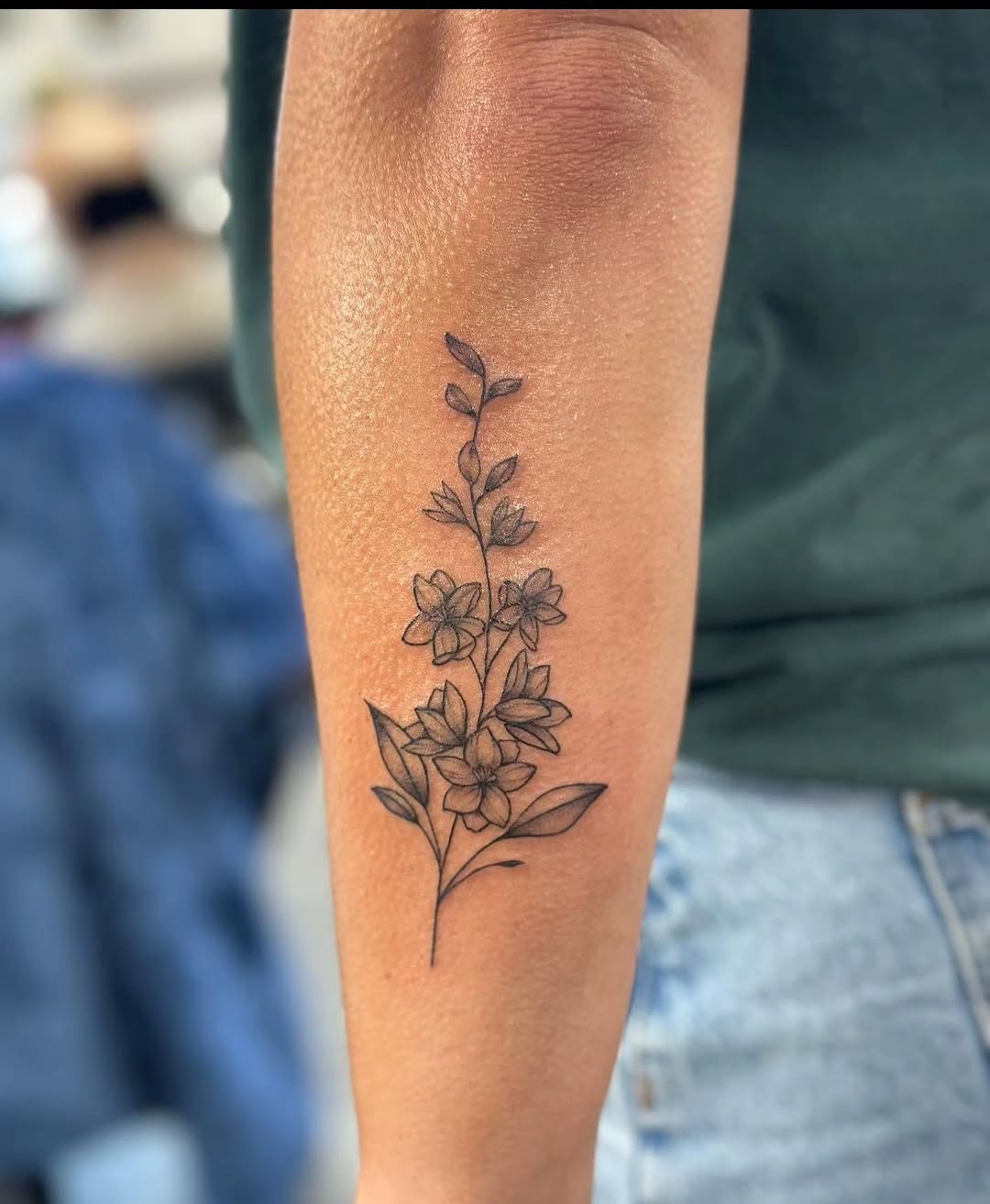 28 Larkspur Tattoo Ideas: Delicate July Blooms with Big Meaning