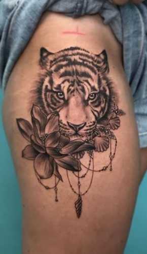 25 Tiger Tattoo on Thigh Ideas