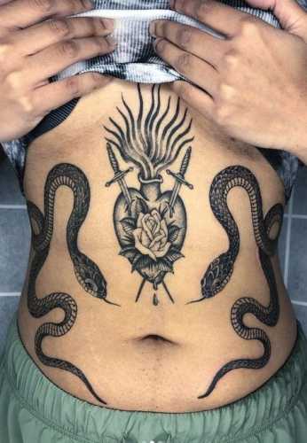 21 Mesmerizing Snake Tattoos on Stomach Ideas