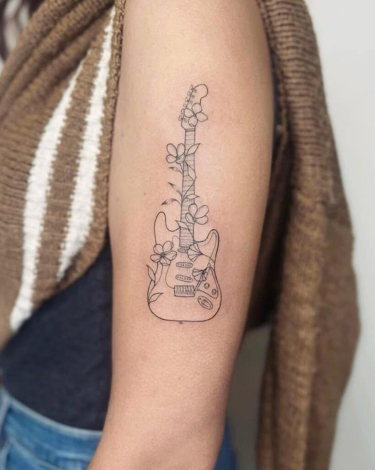 31 Guitar Tattoo Ideas for Music Lovers: From Minimalist Designs to Bold Sleeve Art