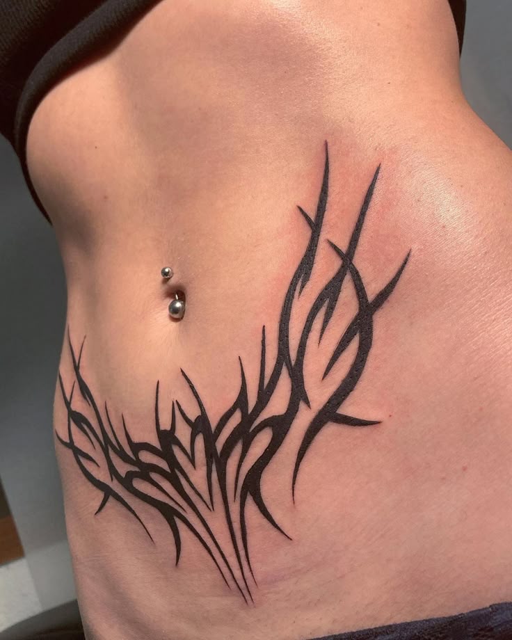 29 Womb Tattoo Ideas for : Floral, Anime, Goth, Succubus, and Symbolic Designs