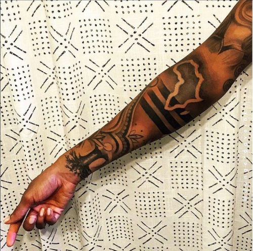 Explore Top 18 Afro Tattoo Designs of : Cultural Heritage Meets Modern Artistry