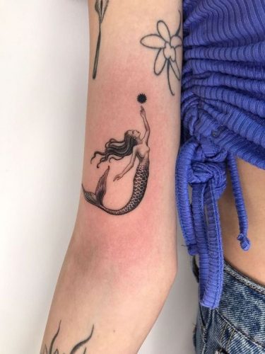 Discover Enchanting Small Mermaid Tattoos – Top 15 Designs for a Magical