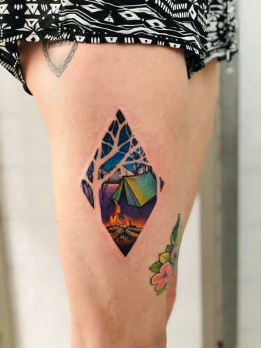 Discover the Great Outdoors on Your Skin: 20 Inspiring Camping Tattoo Designs for Nature Lovers in