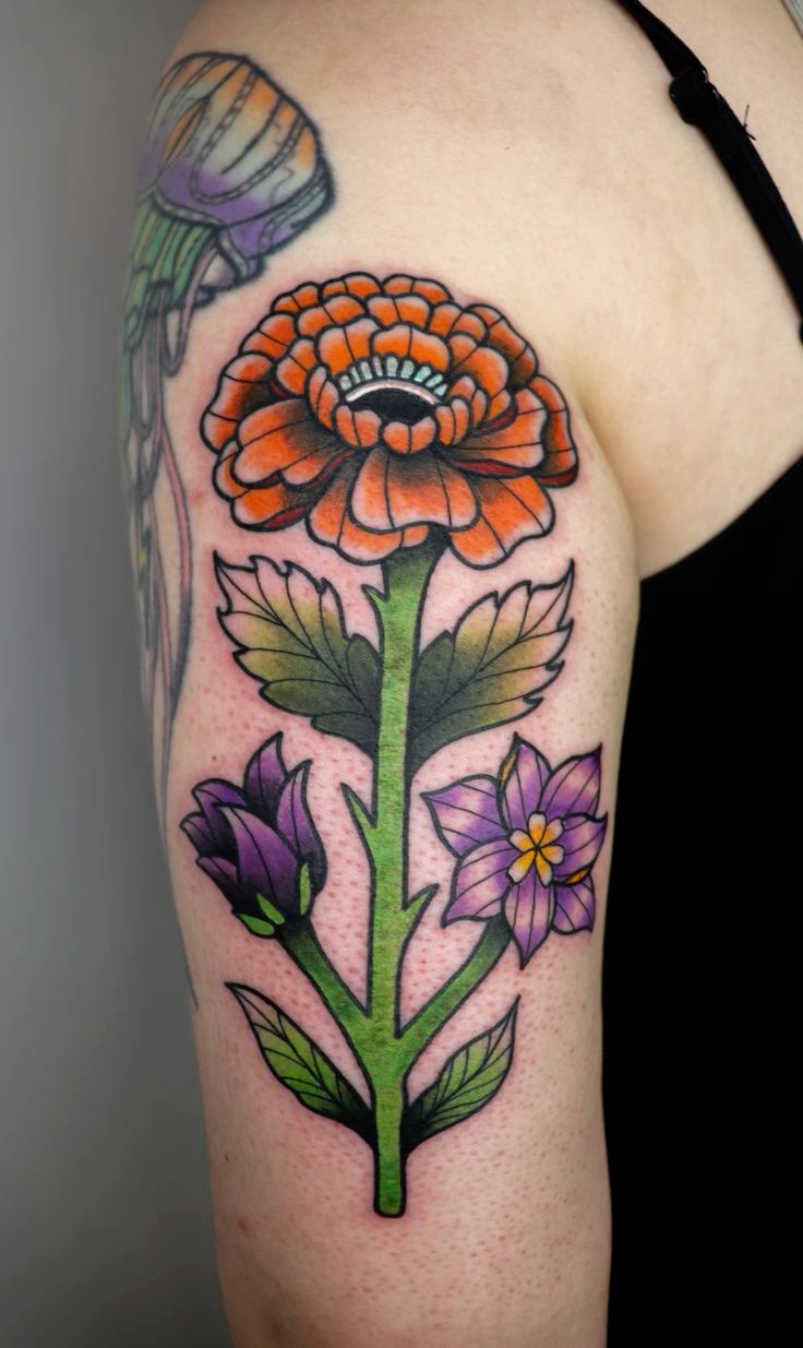 26 Marigold Tattoo Ideas for Every Style Fineline, Realistic, Black and White, Traditional, and Color Designs