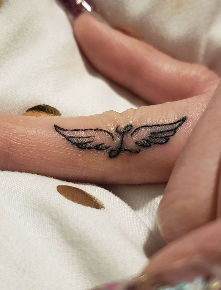 Wings Tattoo 28 Ideas: Stunning Angel, Phoenix, Icarus, Back, Arm & Chest Designs